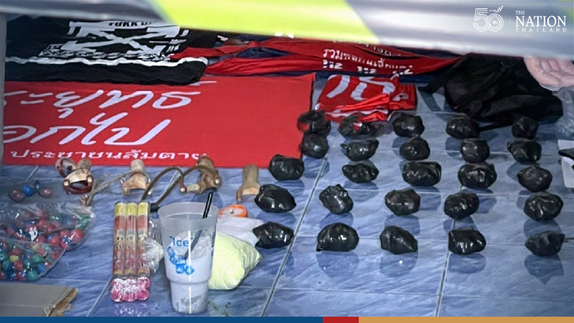 Two ‘Thalu Fah’ protests are arrested for throwing bomb to a police