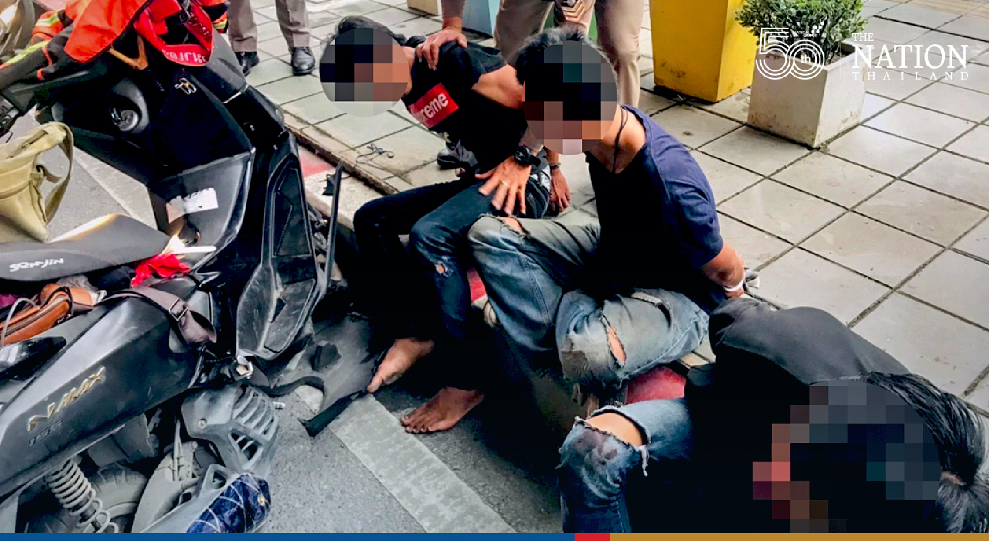 Three held for allegedly lobbing bomb at police car