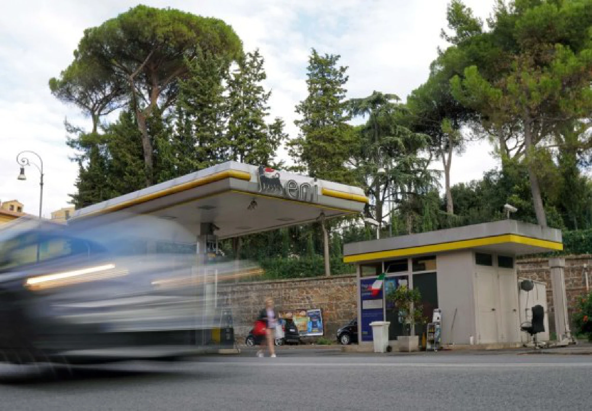A vehicle passes by a gas station in Rome, Italy, on Oct. 9, 2021. (Xinhua/Jin Mamengni)