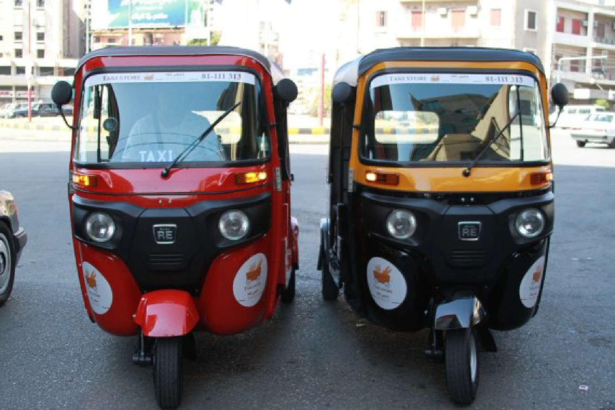 Two tuk-tuks wait for passengers on a street in Tripoli, Lebanon, on Oct. 8, 2021. (Photo by Khaled/Xinhua)