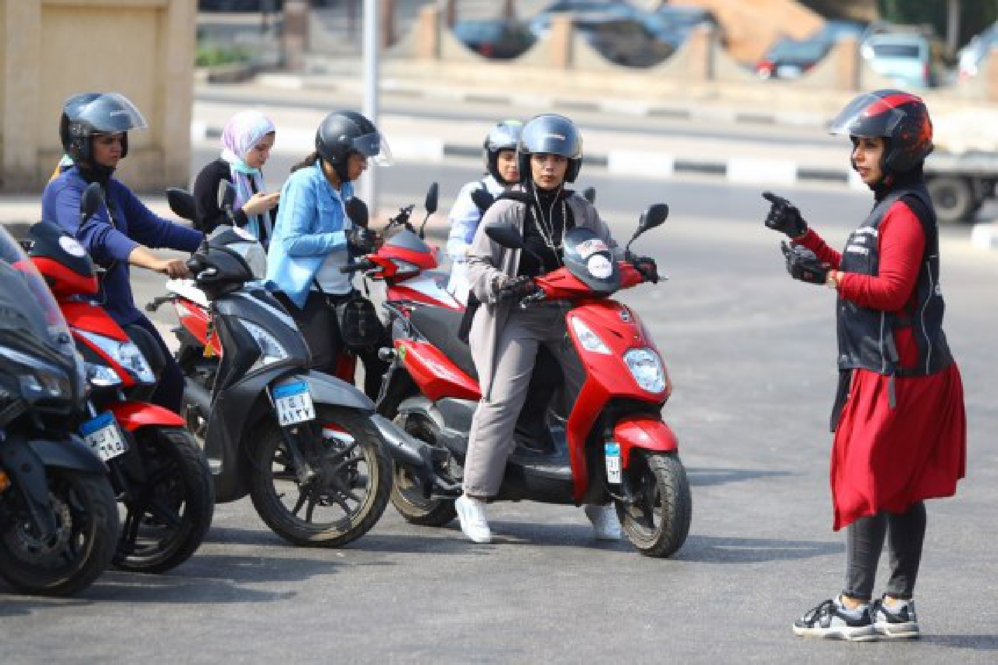 Women of different ages ride their motorcycles and scooters for some 30 km on the Cairo-Suez highway on Oct. 1, 2021. (Xinhua/Ahmed Gomaa)