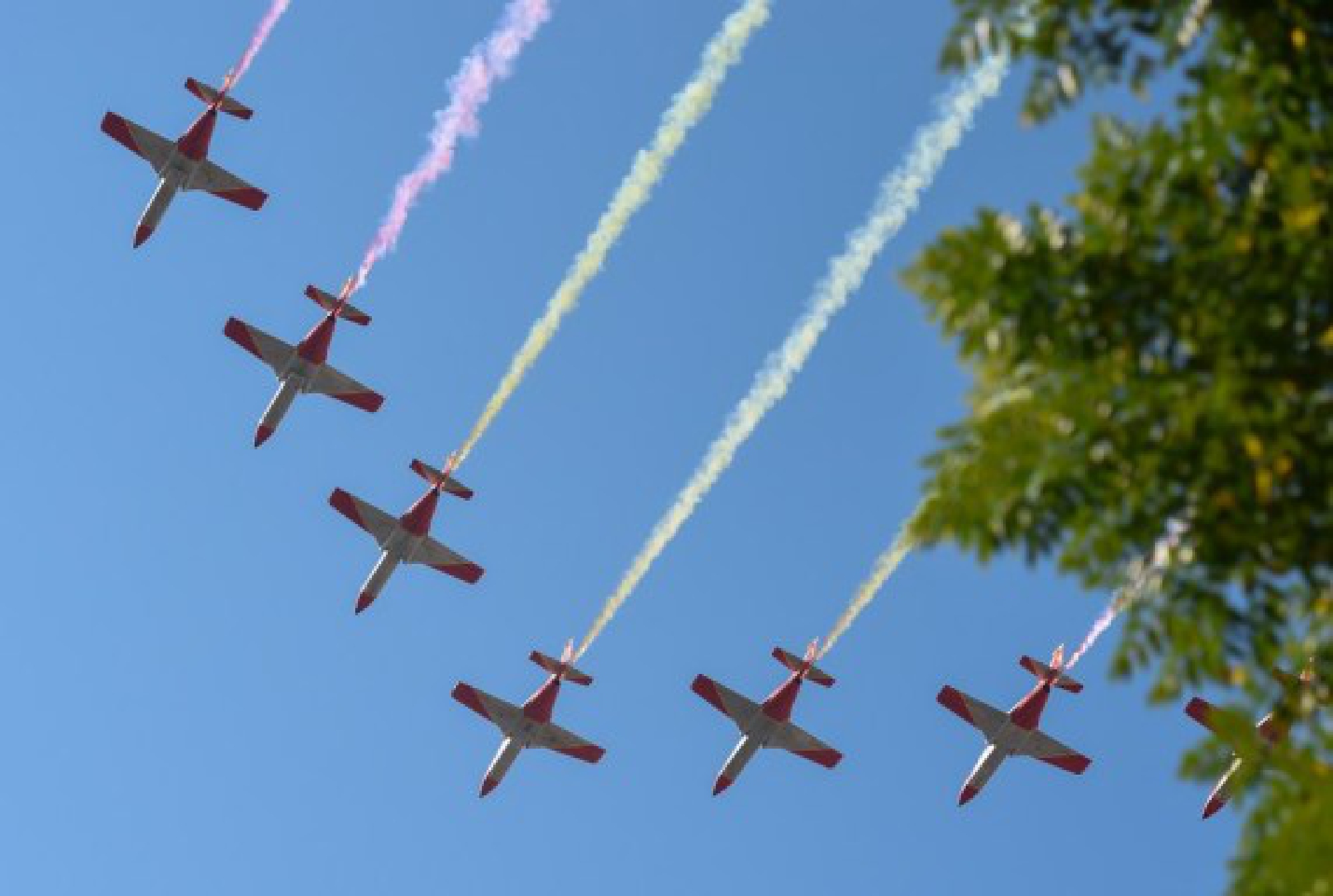 Planes fly at a parade to celebrate the National Day of Spain in Madrid, Spain, Oct. 12, 2021. (Xinhua/Gustavo Valiente)