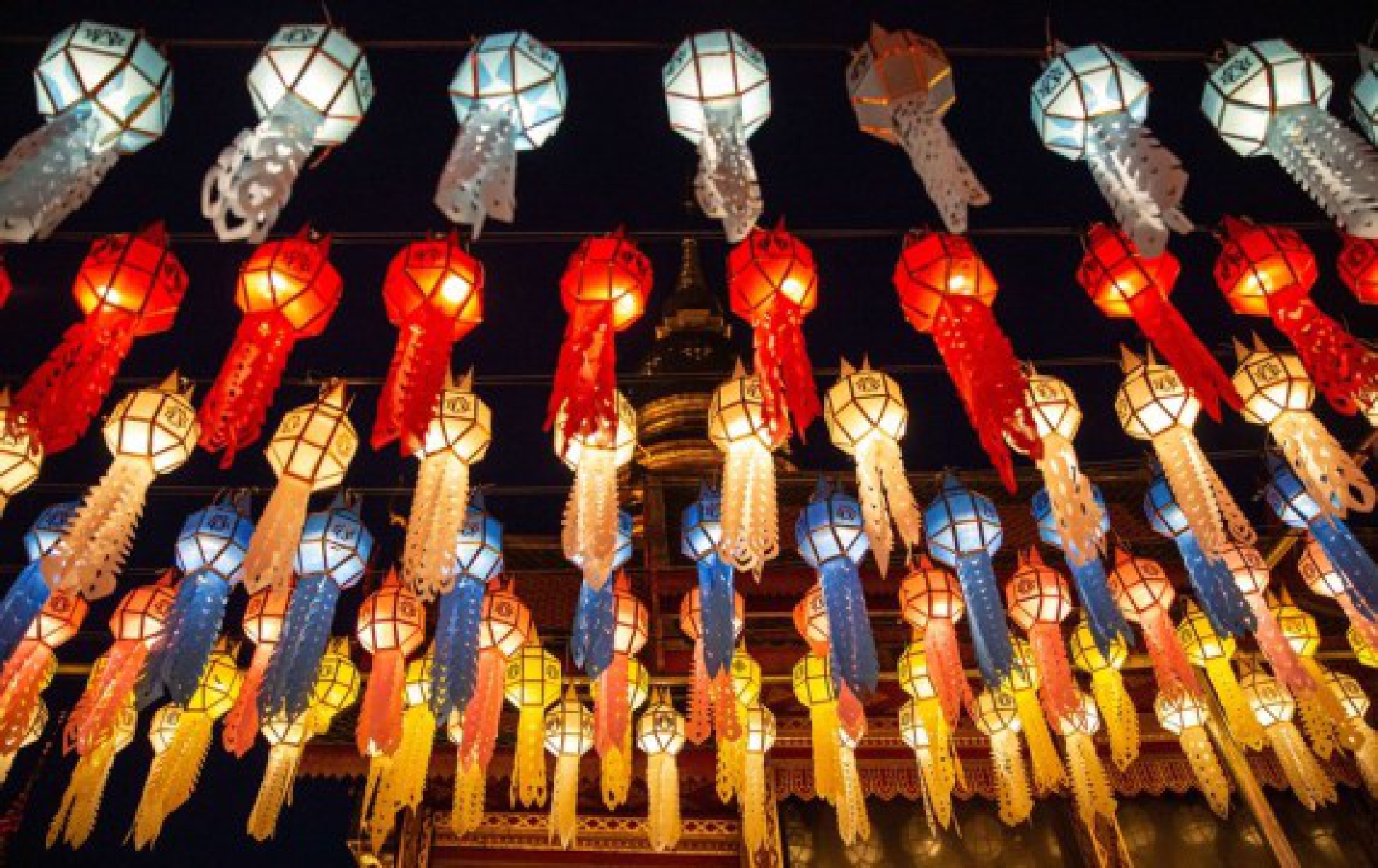 Colorful lanterns are seen at the Wat Phra That Hariphunchai in Lamphun, Thailand, Oct. 25, 2021. (Xinhua/Wang Teng)