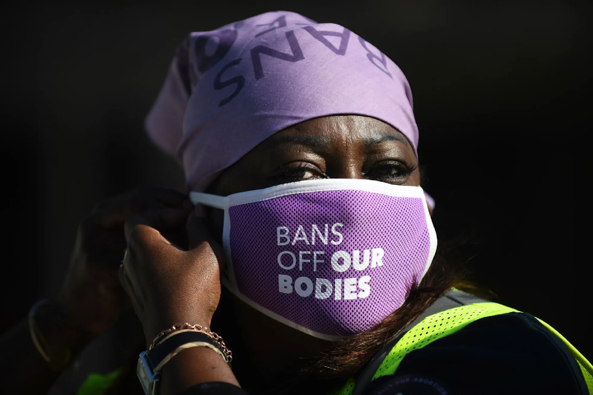 Volunteers, among them Debora Mims, 56, from D.C., gathered Saturday at Freedom Plaza for the Women's March. PHOTO CREDIT: photo for The Washington Post by Astrid Riecken.