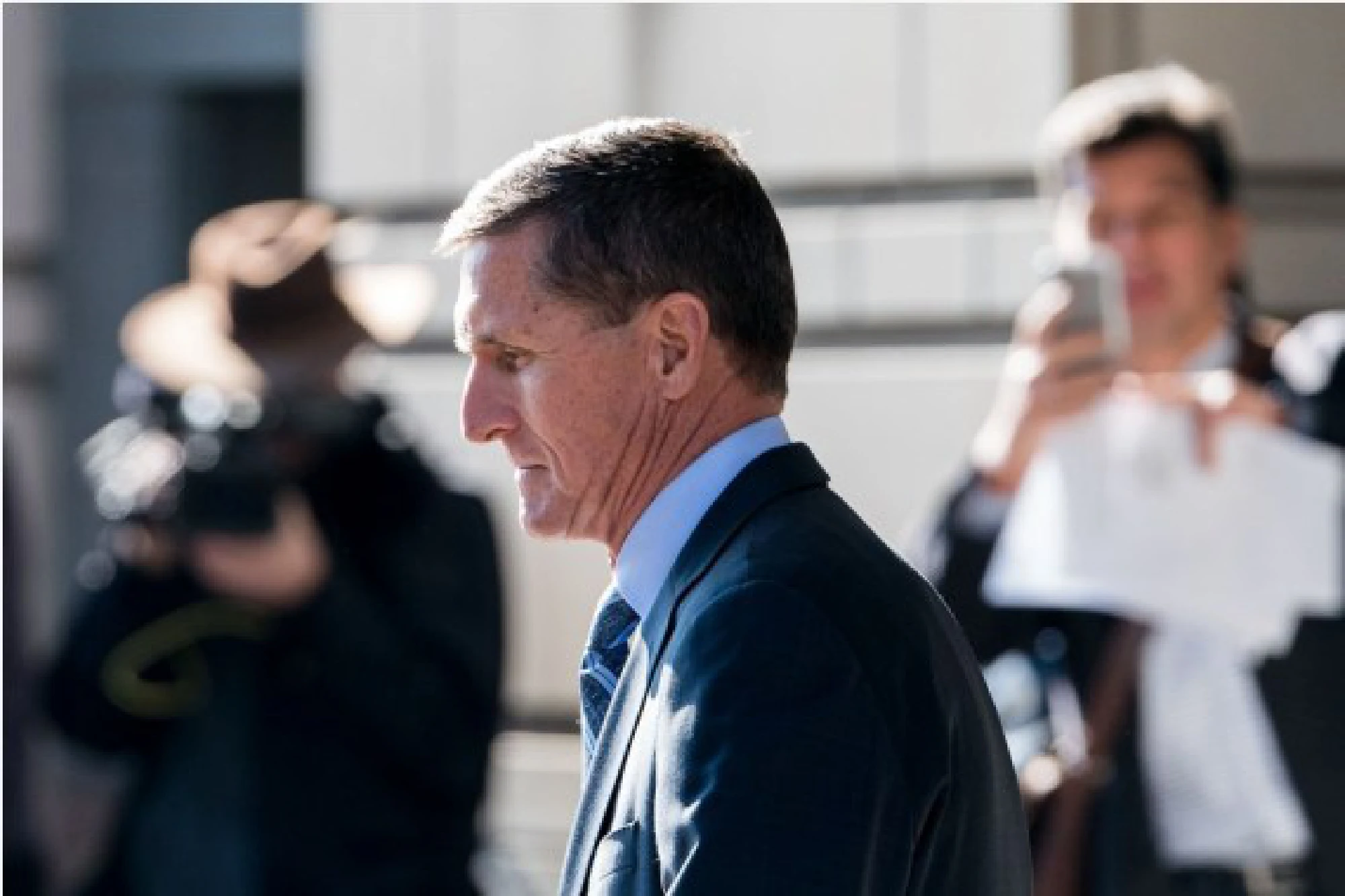 Former U.S. National Security Adviser Michael Flynn leaves the federal court following his plea hearing in Washington D.C., the United States, on Dec. 1, 2017. (Xinhua/Ting Shen)