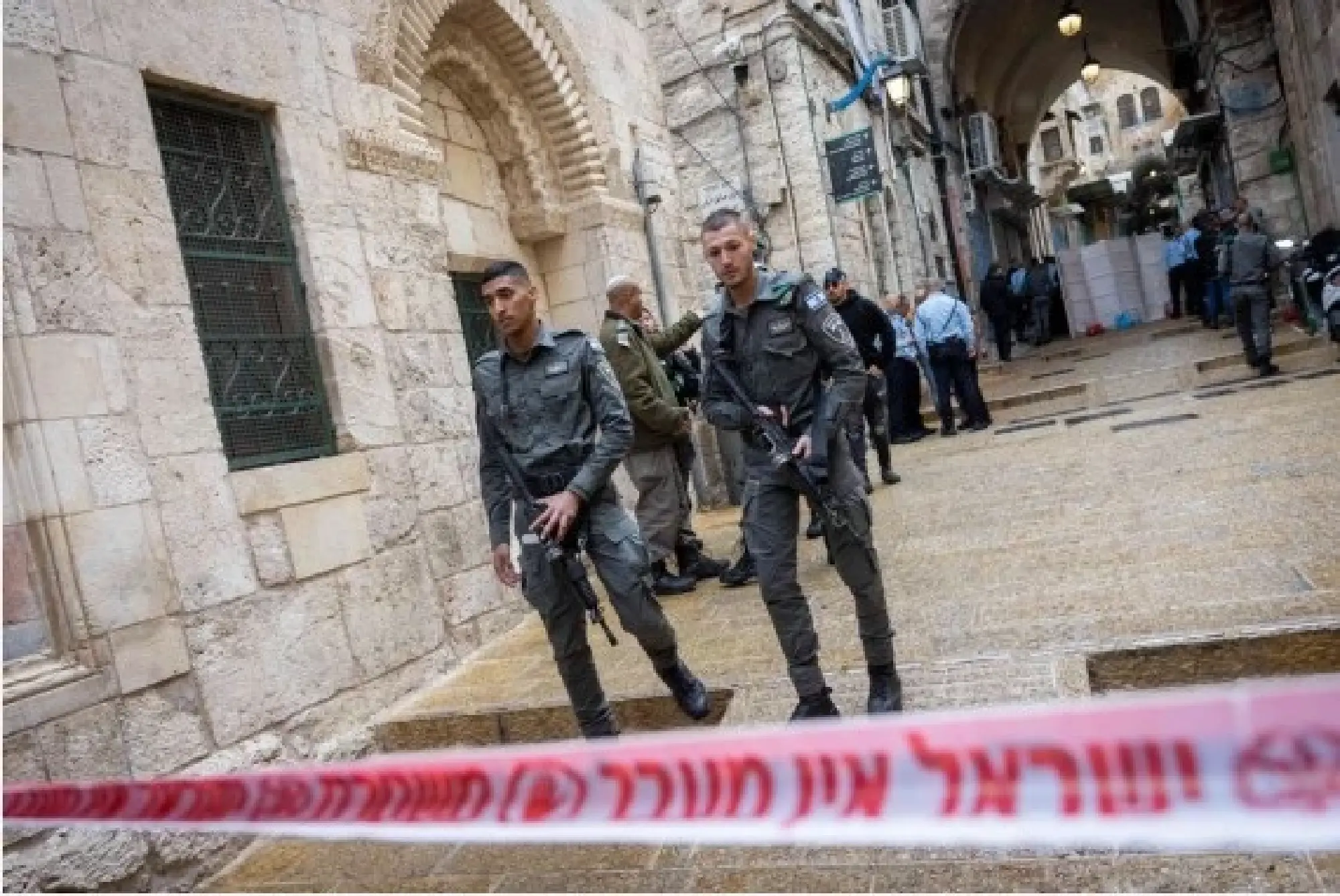 Israeli police officials gather near the site of a shooting incident in Jerusalem's Old City on Nov. 21, 2021. (Photo by JINI via Xinhua)