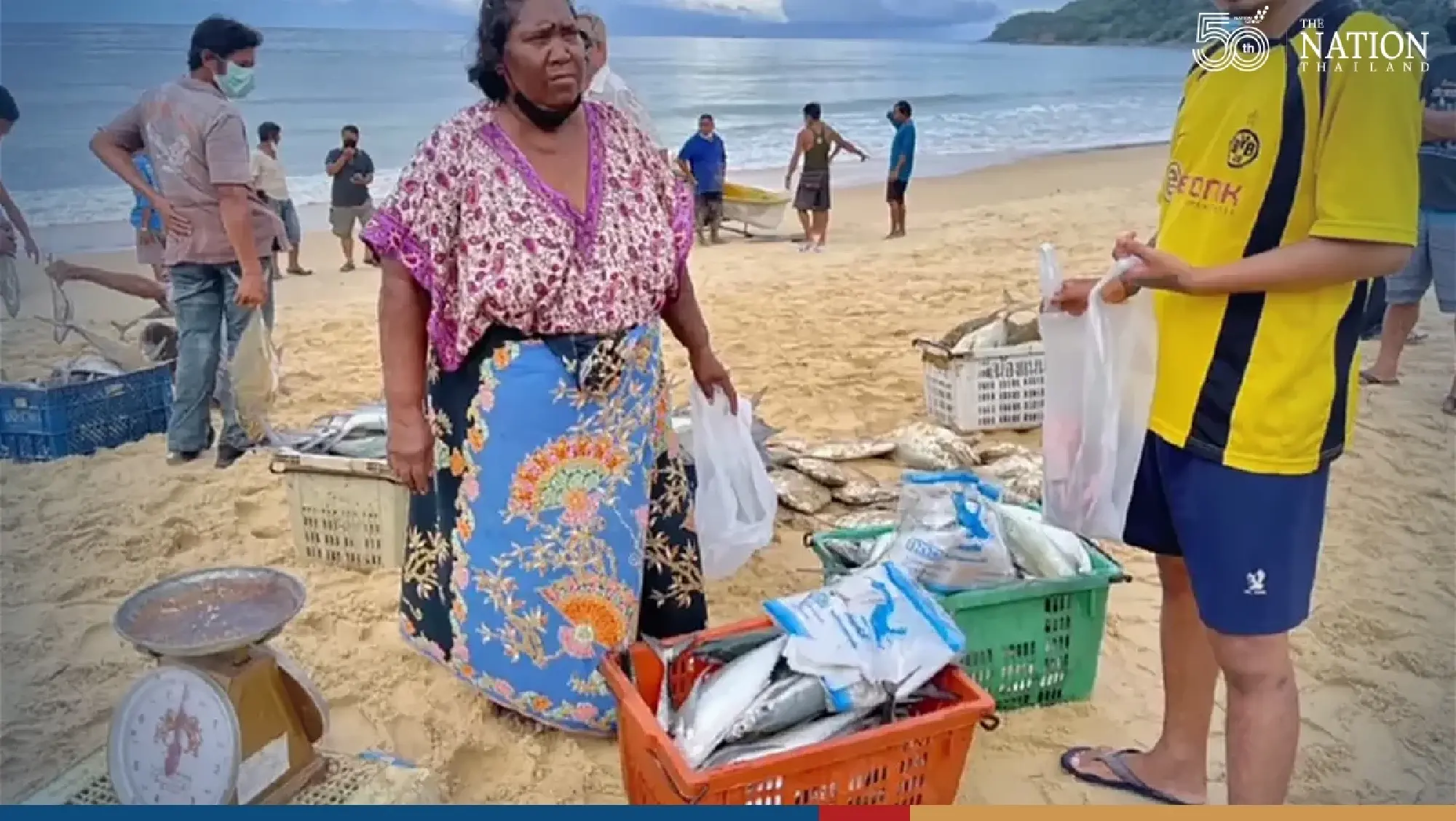 Ebbing tide leaves behind a bounty for Phuket