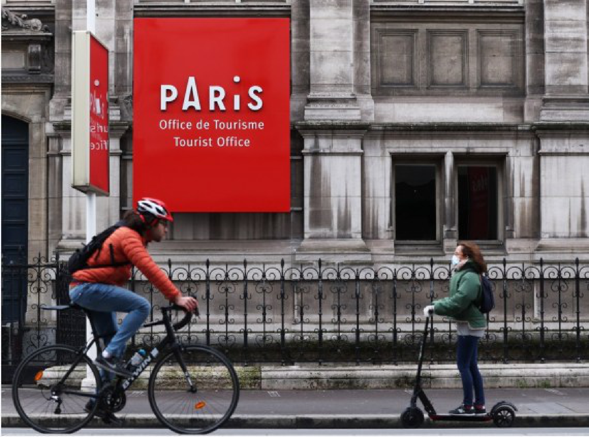 People pass by the Tourist Office located in the City Hall of Paris, France, Feb. 19, 2021. (Xinhua/Gao Jing)