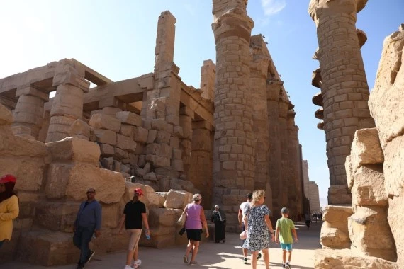 Tourists visit the Karnak Temple Complex in Luxor, Egypt, on Nov. 26, 2021. (Xinhua/Ahmed Gomaa)