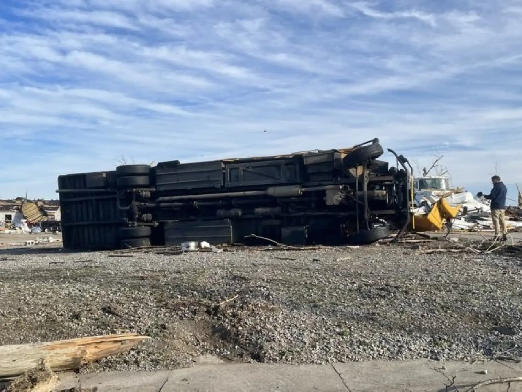 Photo taken on Dec. 11, 2021 shows a vehicle damaged in tornadoes in Mayfield, Kentucky, the United States. (Photo by Caromirna Sanchez/Xinhua)