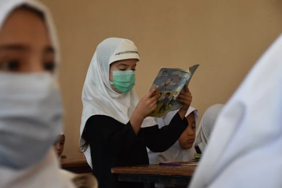Afghan girls attend a class at a local school in Mazar-i-Sharif, capital of Balkh province, Afghanistan, Sept. 14, 2021. (Photo by Kawa Basharat/Xinhua)