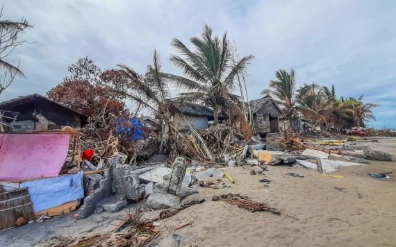Photo shows a fishing community damaged by Typhoon Rai along a shoreline in Leyte Province, the Philippines, Dec. 22, 2021. (Xinhua)