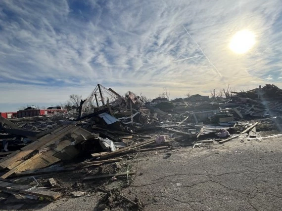Photo taken on Dec. 11, 2021 shows houses damaged in tornadoes in Mayfield, Kentucky, the United States. (Photo by Caromirna Sanchez/Xinhua)