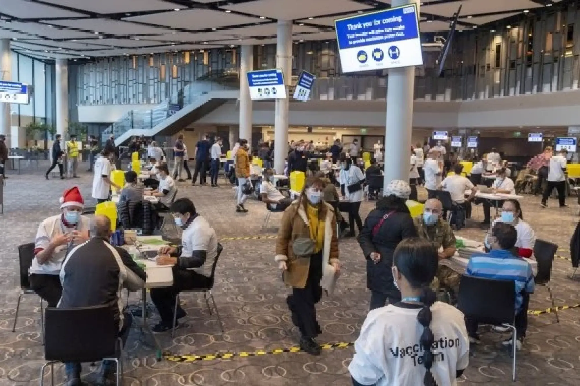 Photo taken on Dec. 19, 2021 shows a general view of NHS (National Health Service) COVID Vaccine Center at Wembley Stadium in London, Britain. (Photo by Ray Tang/Xinhua) 