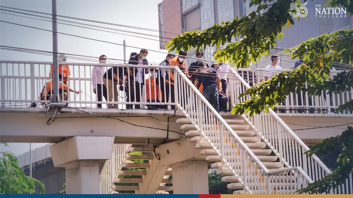 Thonburi pedestrian bridge cluttered with internet cables, not live wires