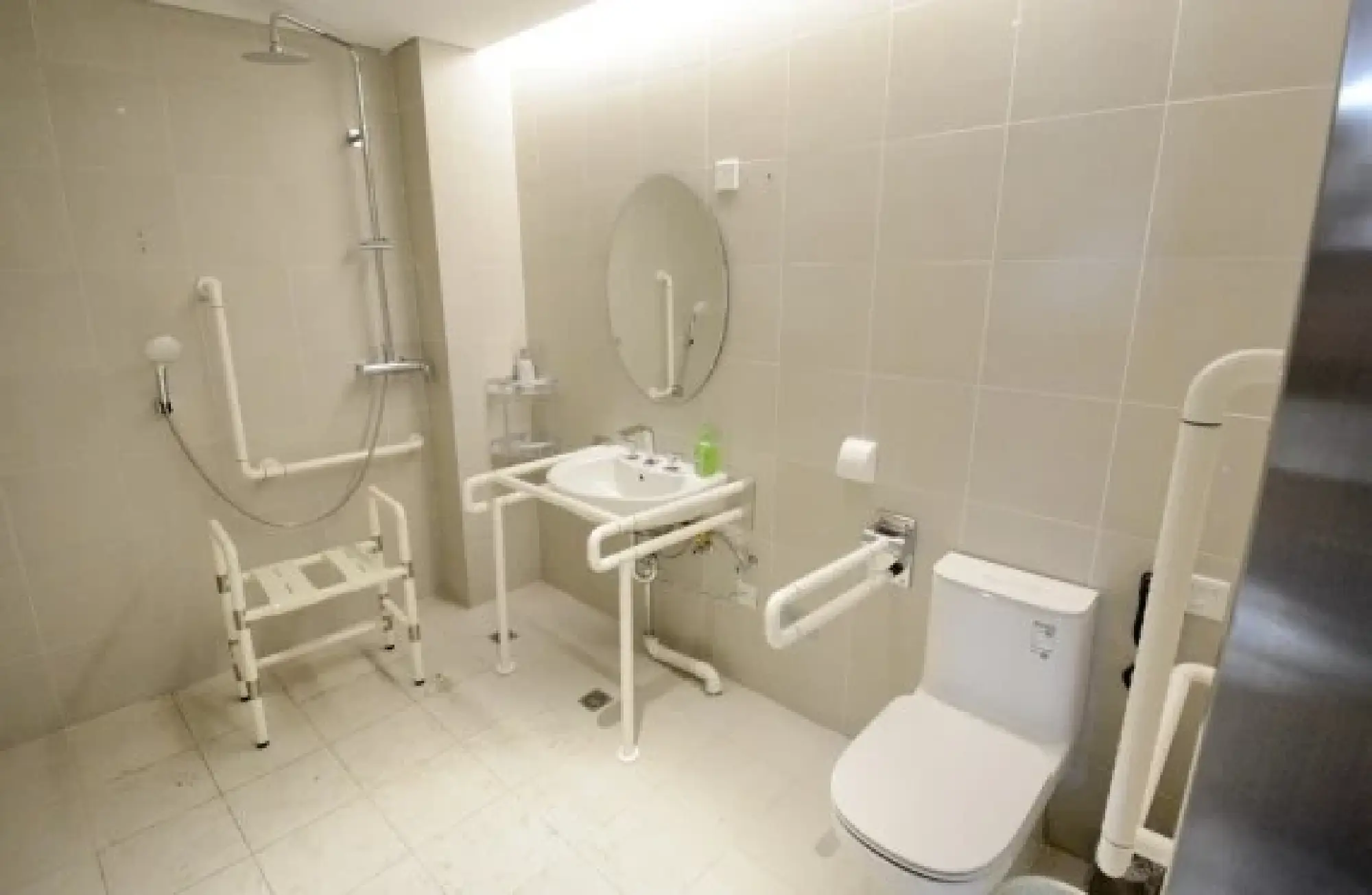 Photo taken on July 15, 2021 shows the barrier-free toilet facilities at the athletes' village for the Beijing 2022 Paralympic Winter Games in Beijing's northwestern Yanqing district, China. (Xinhua/Li Xin)