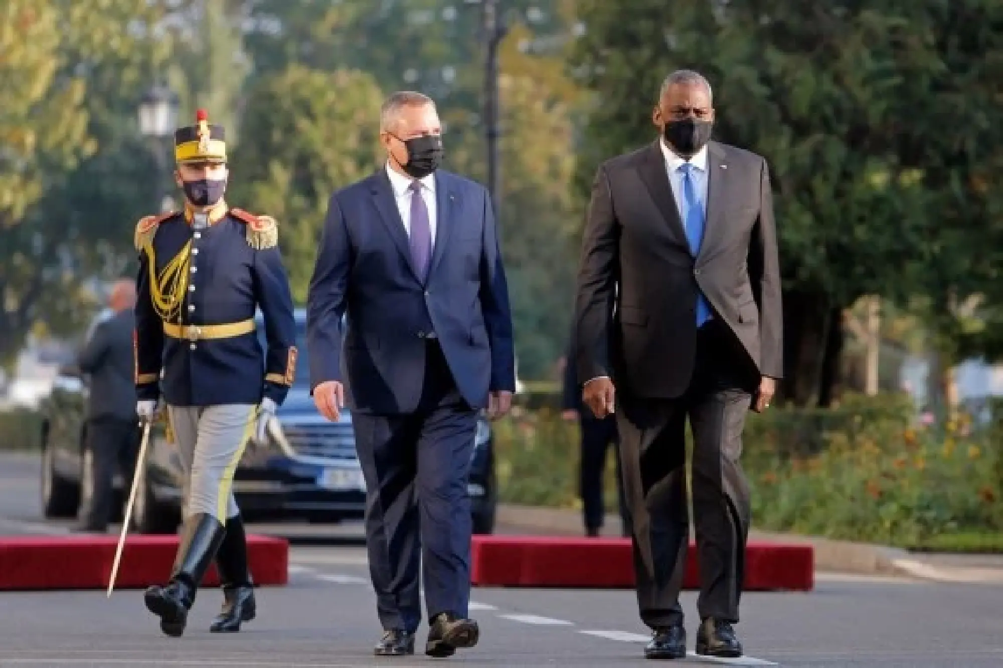 File photo taken on Oct. 20, 2021 shows U.S. Secretary of Defense Lloyd Austin (R) attending an official welcoming ceremony with Romania's Defense Minister Nicolae Ciuca in Bucharest, Romania. (Photo by Cristian Cristel/Xinhua)