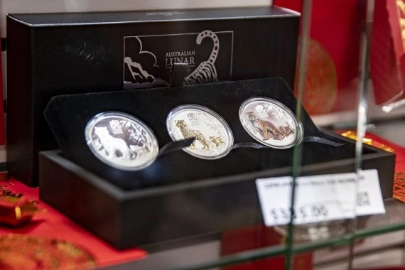 Coins for the Year of Tiger are seen in a post office in Sydney, Australia, on Jan. 14, 2022. (Xinhua/Bai Xuefei)