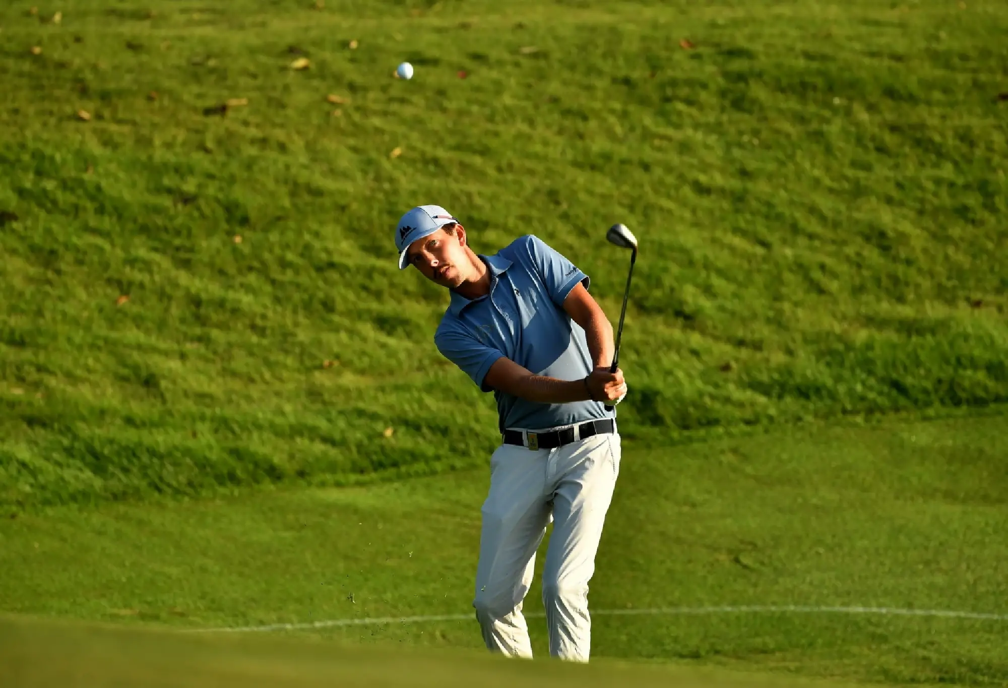 Hole in one, eagle finish puts Chan in control