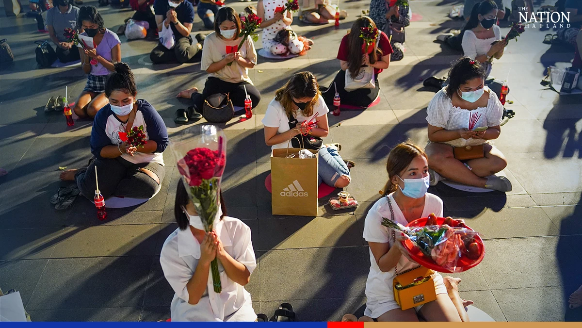 Praying for a happy Valentine's at Bangkok's shrine to love