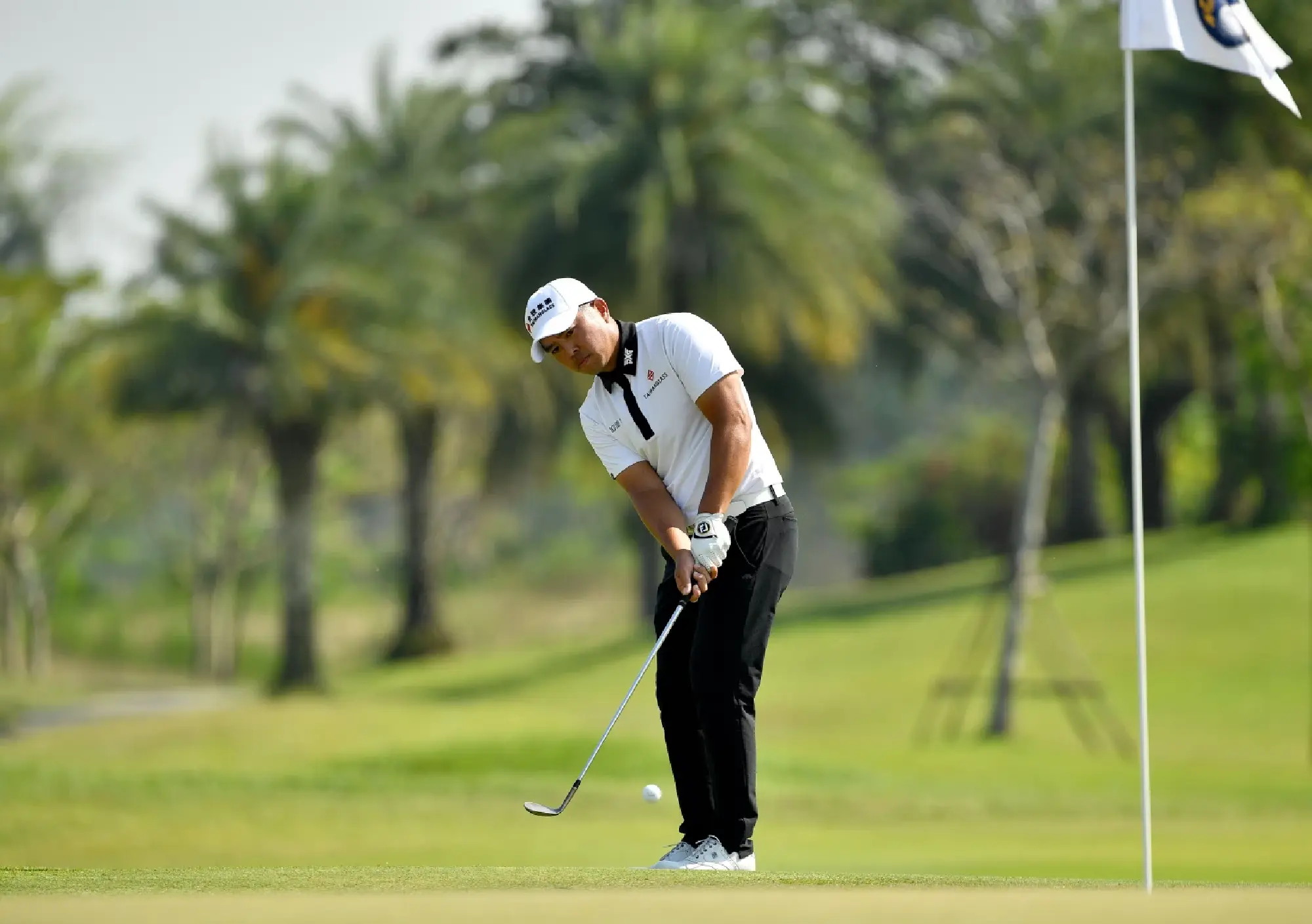 Checkered flag for Chan Shih-chang at Grand Prixv