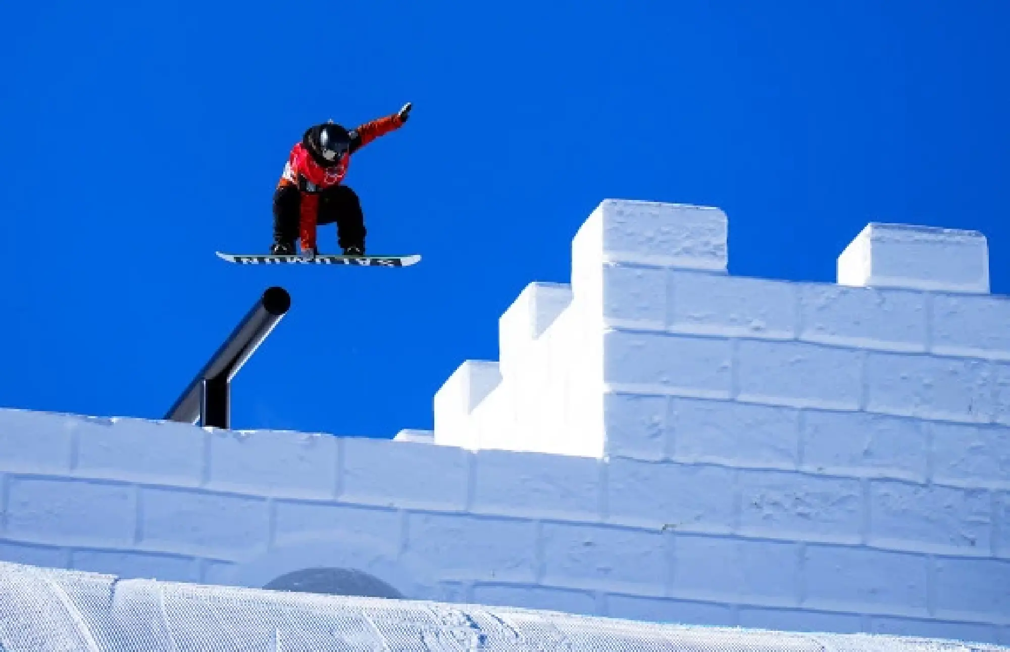 Carola Niemelae of Finland competes during the women's snowboard slopestyle qualification at the Genting Snow Park in Zhangjiakou, north China's Hebei Province, Feb. 5, 2022. (Xinhua/Xu Chang)