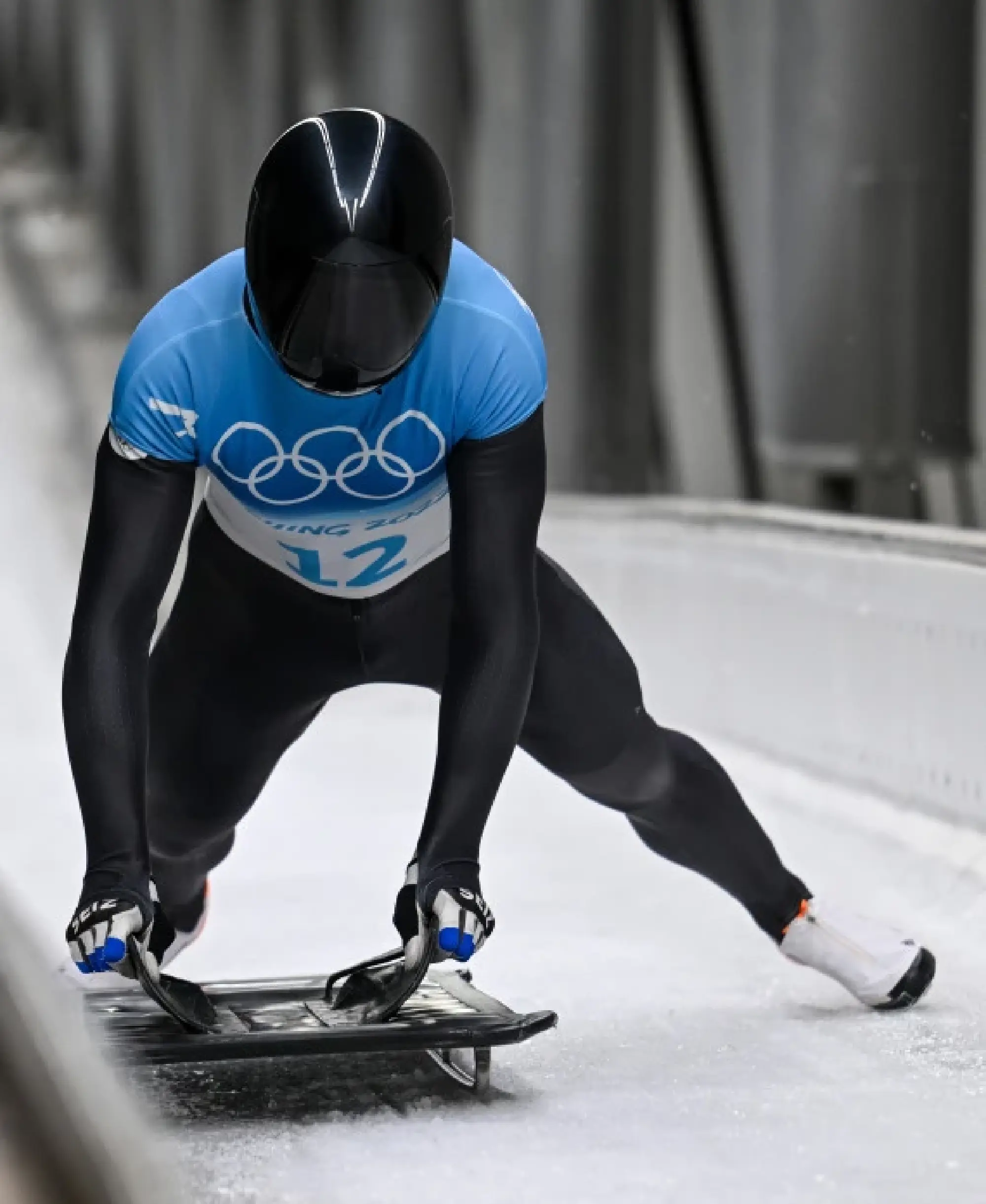 Evgeniy Rukosuev of ROC competes during skeleton men heat of Beijing 2022 Winter Olympics at National Sliding Centre in Yanqing District, Beijing, capital of China, Feb. 11, 2022. (Xinhua/Jiang Wenyao)