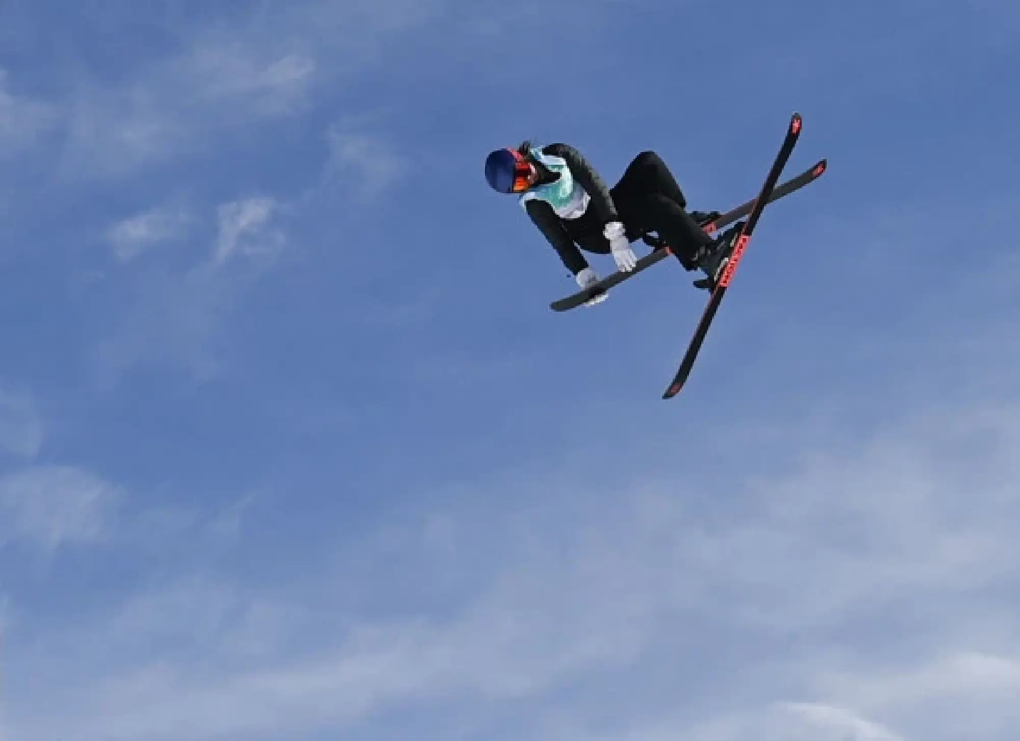 Gu Ailing of China competes during the women's freeski big air qualification at Big Air Shougang in Beijing, capital of China, Feb. 7, 2022. (Xinhua/Huang Zongzhi)