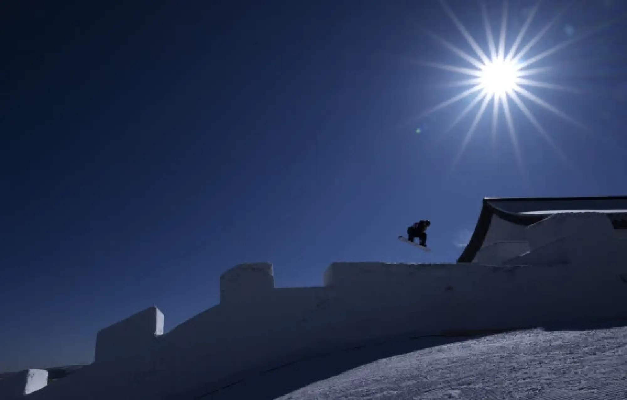 Annika Morgan of Germany competes during the women's snowboard slopestyle qualification at the Genting Snow Park in Zhangjiakou, north China's Hebei Province, Feb. 5, 2022. (Xinhua/Fei Maohua)