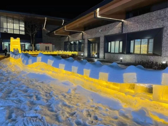 photo, taken on Jan. 25, 2022, shows the Great Wall made with ice at the Olympic village in Yanqing zone. (Christof Baer)