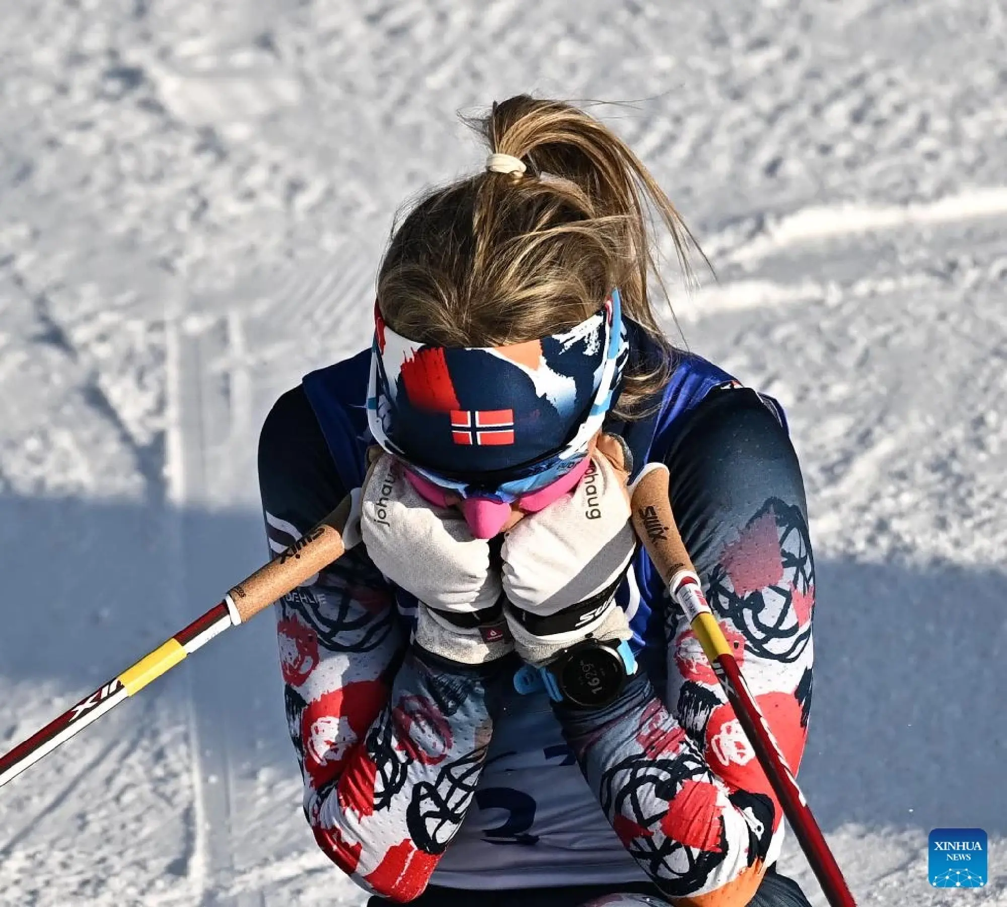 Norway's Therese Johaug celebrates after winning the Cross-Country Skiing Women's 7.5km + 7.5km Skiathlon at National Cross-Country Skiing Centre in Zhangjiakou, north China's Hebei Province, Feb. 5, 2022. (Xinhua/Xiao Yijiu)