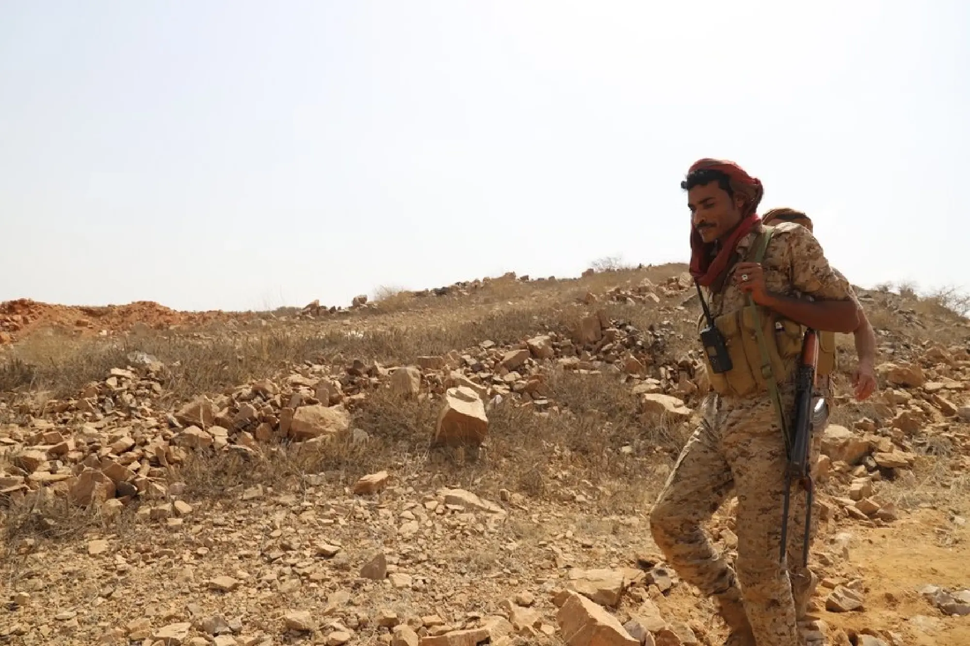 Yemeni government soldiers patrol in Harad district of Hajjah province, which is a frontline between the Houthi militia and the internationally-recognized government in northern Yemen, on Feb. 10, 2022. (Photo by Mohammed Al-Wafi/Xinhua)