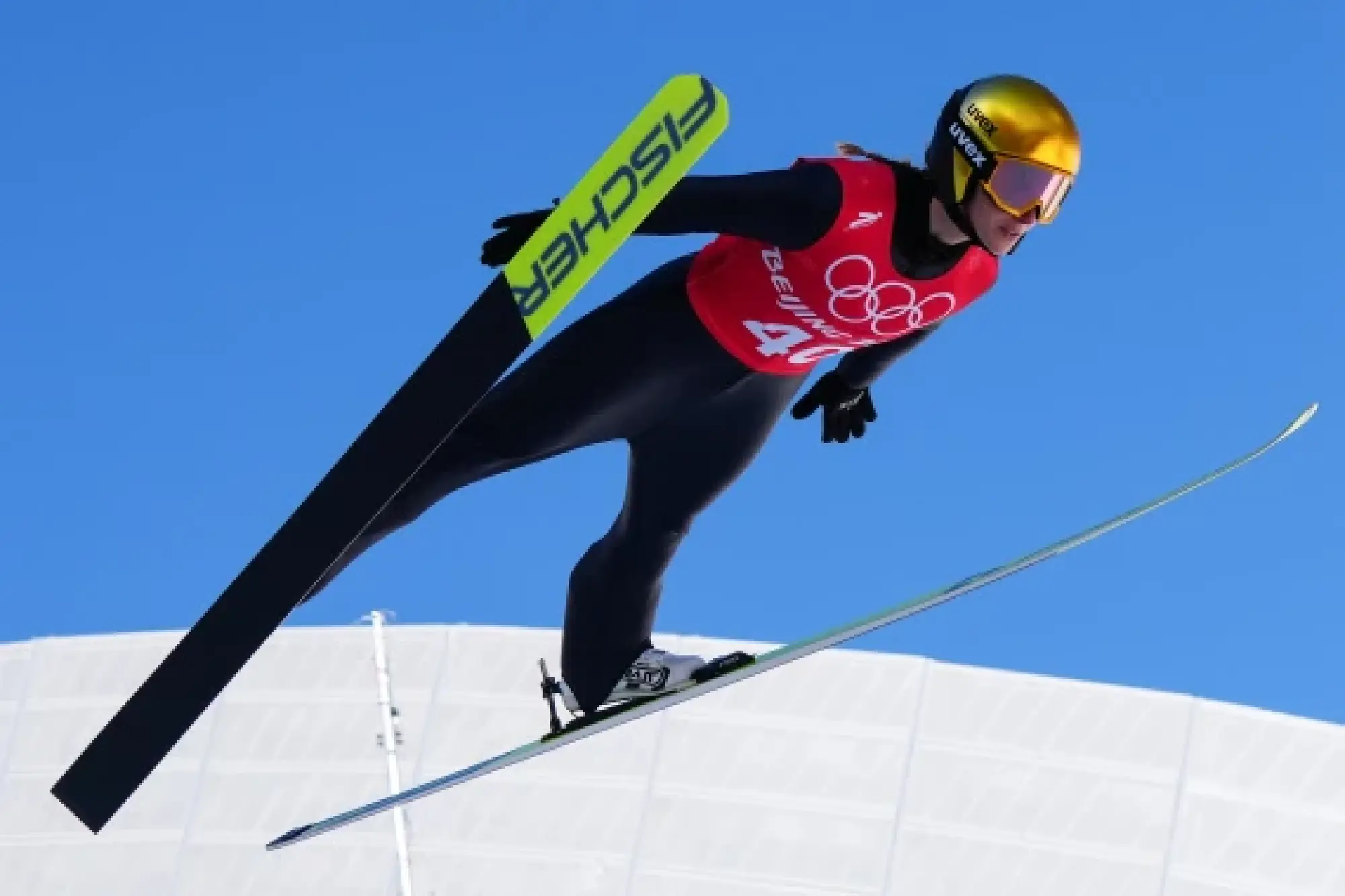 Germany's Katharina Althaus takes part in the Ski Jumping Women's Normal Hill official training at the National Ski Jumping Centre in Zhangjiakou, north China's Hebei Province, Feb. 4, 2022. (Xinhua/Zhu Zheng)