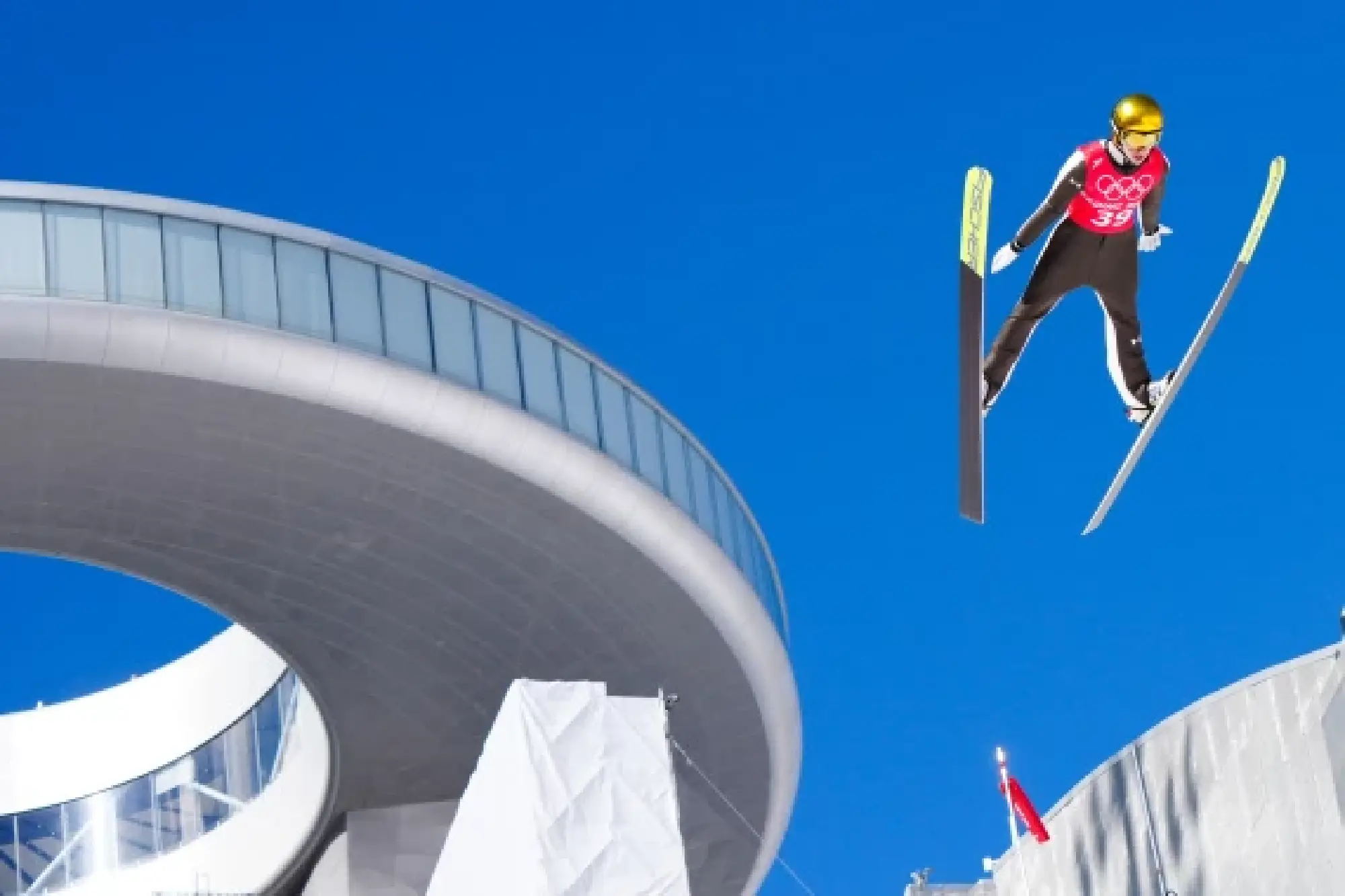 Slovenia's Ursa Bogataj takes part in the Ski Jumping Women's Normal Hill official training at the National Ski Jumping Centre in Zhangjiakou, north China's Hebei Province, Feb. 4, 2022. (Xinhua/Zhu Zheng)