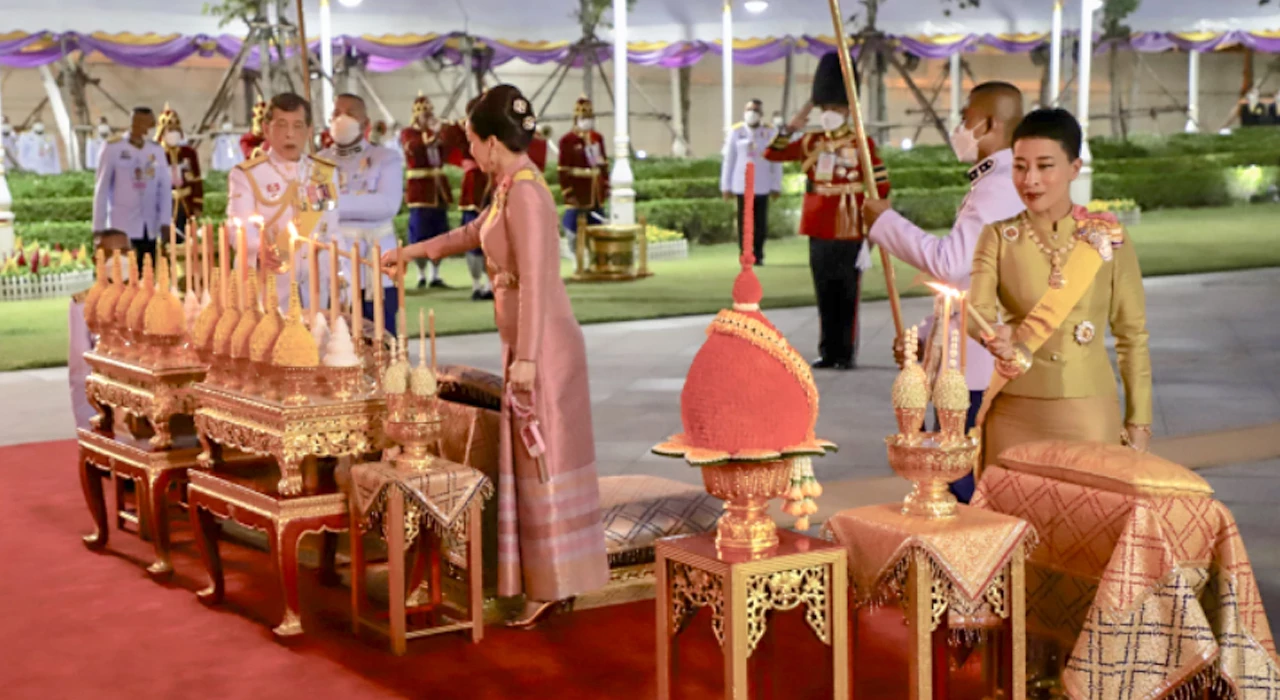 Their Majesties make merit on Chakri Day