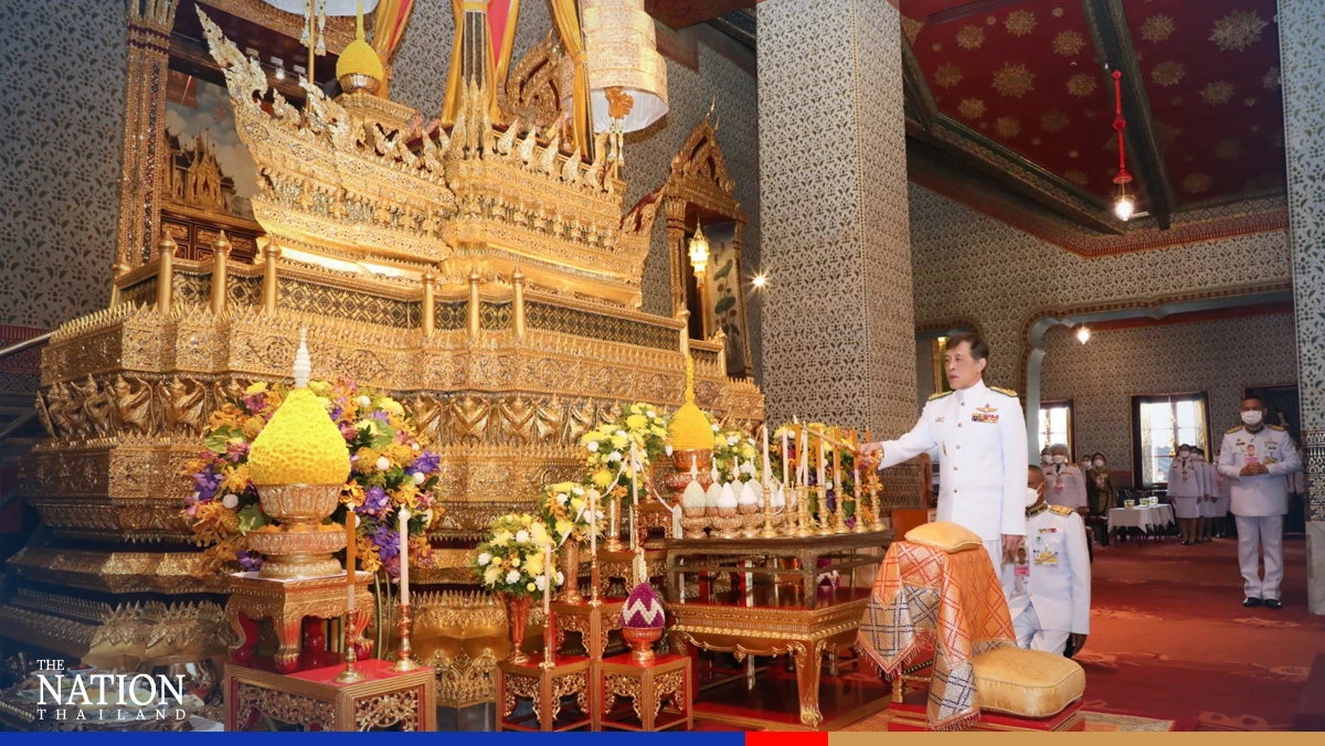 Their Majesties attend Songkran merit-making ceremony