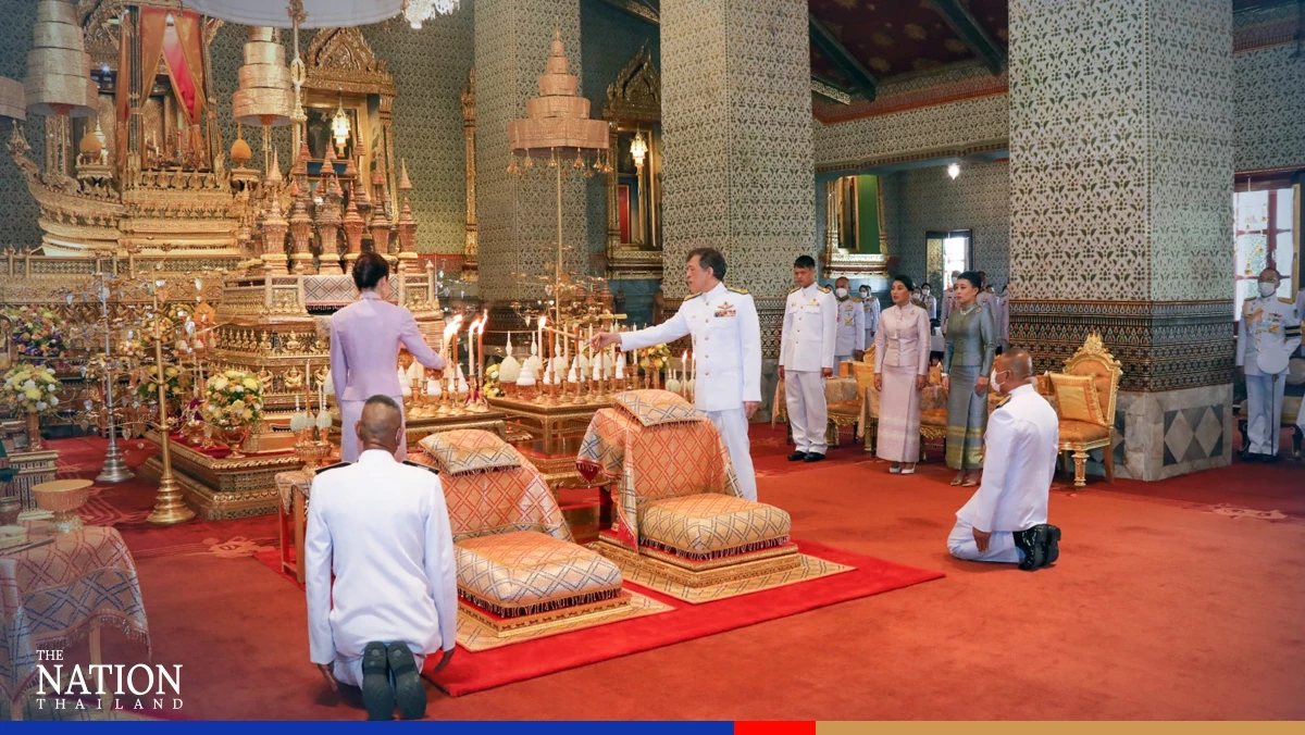 Their Majesties attend Songkran merit-making ceremony