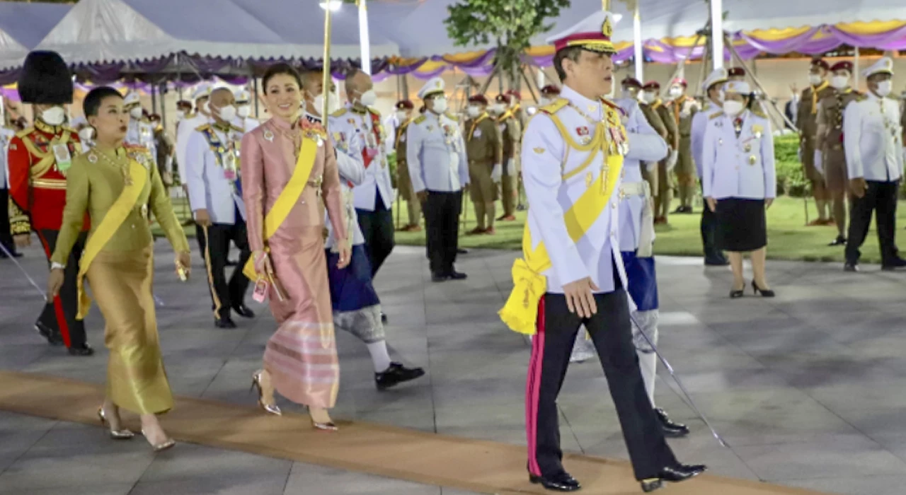 Their Majesties make merit on Chakri Day