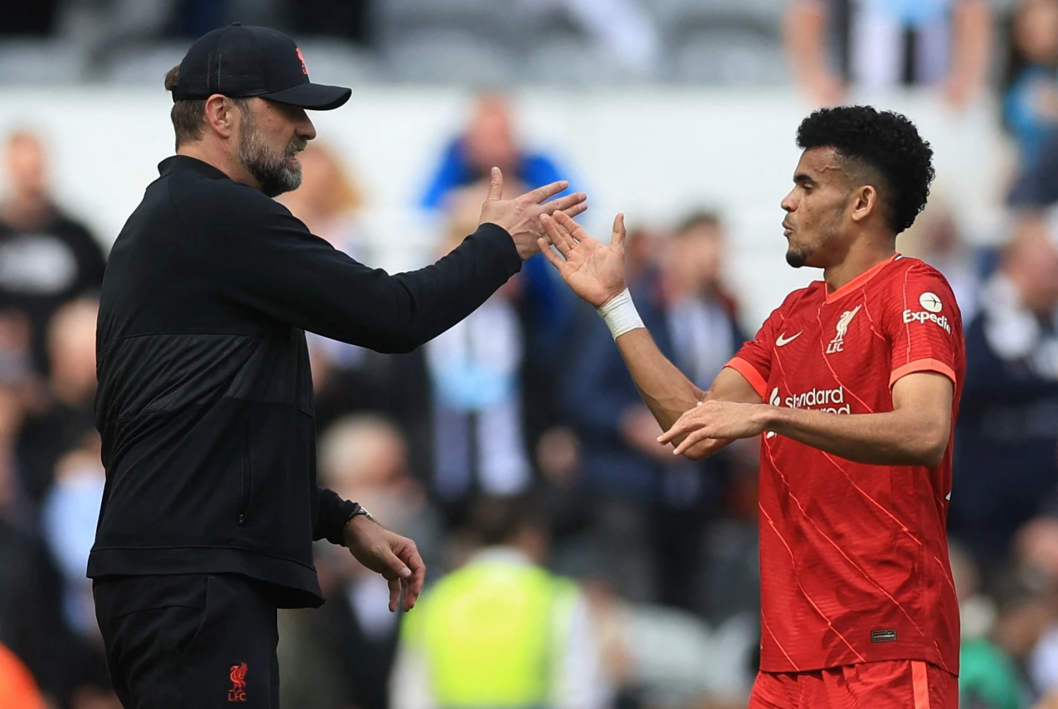 Liverpool manager Juergen Klopp celebrates with Luis Diaz after the match Action Images via Reuters/Lee Smith
