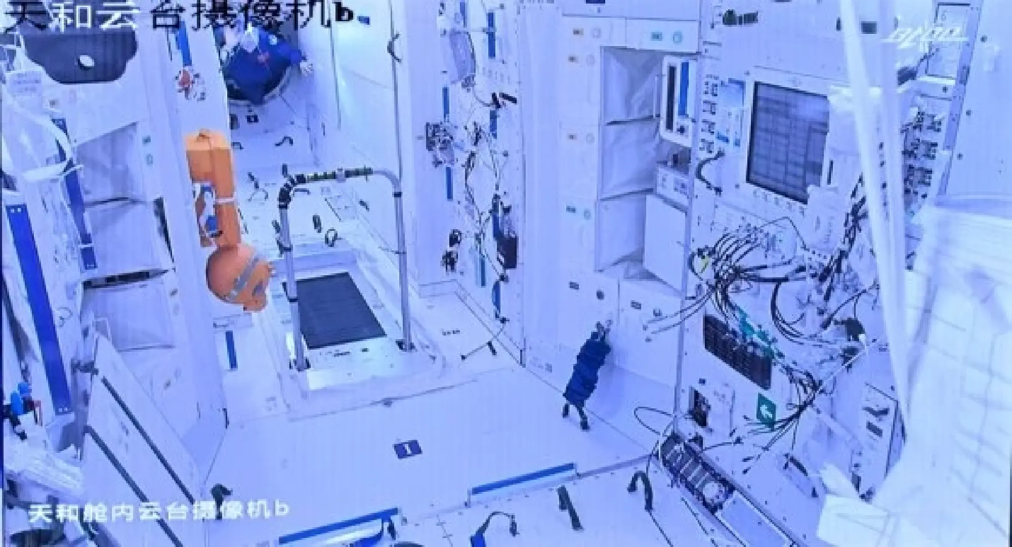 Screen image captured at Beijing Aerospace Control Center on June 5, 2022 shows Chinese astronaut Chen Dong entering the space station core module Tianhe. (Xinhua/Li Xin)