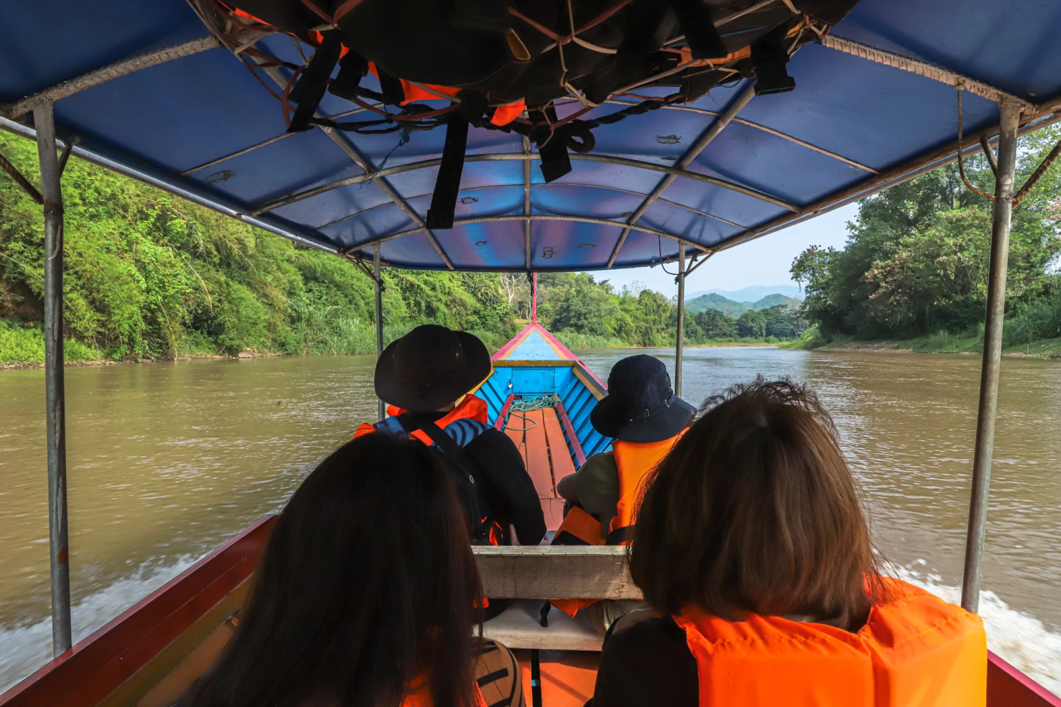 CCF’s staffers and volunteers travel down the Kok River to provide assistance to children in remote areas of Chiang Rai province.