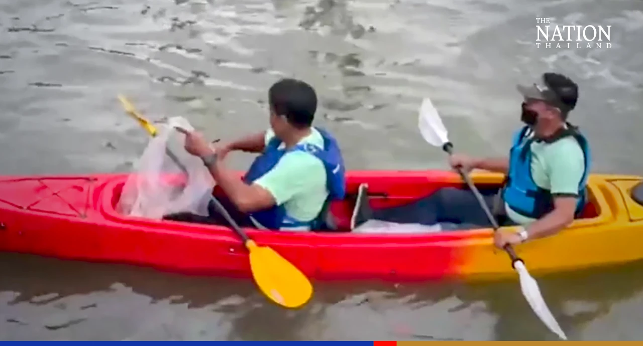 Chadchart cleans Chao Phraya, plants trees to mark Environment Day