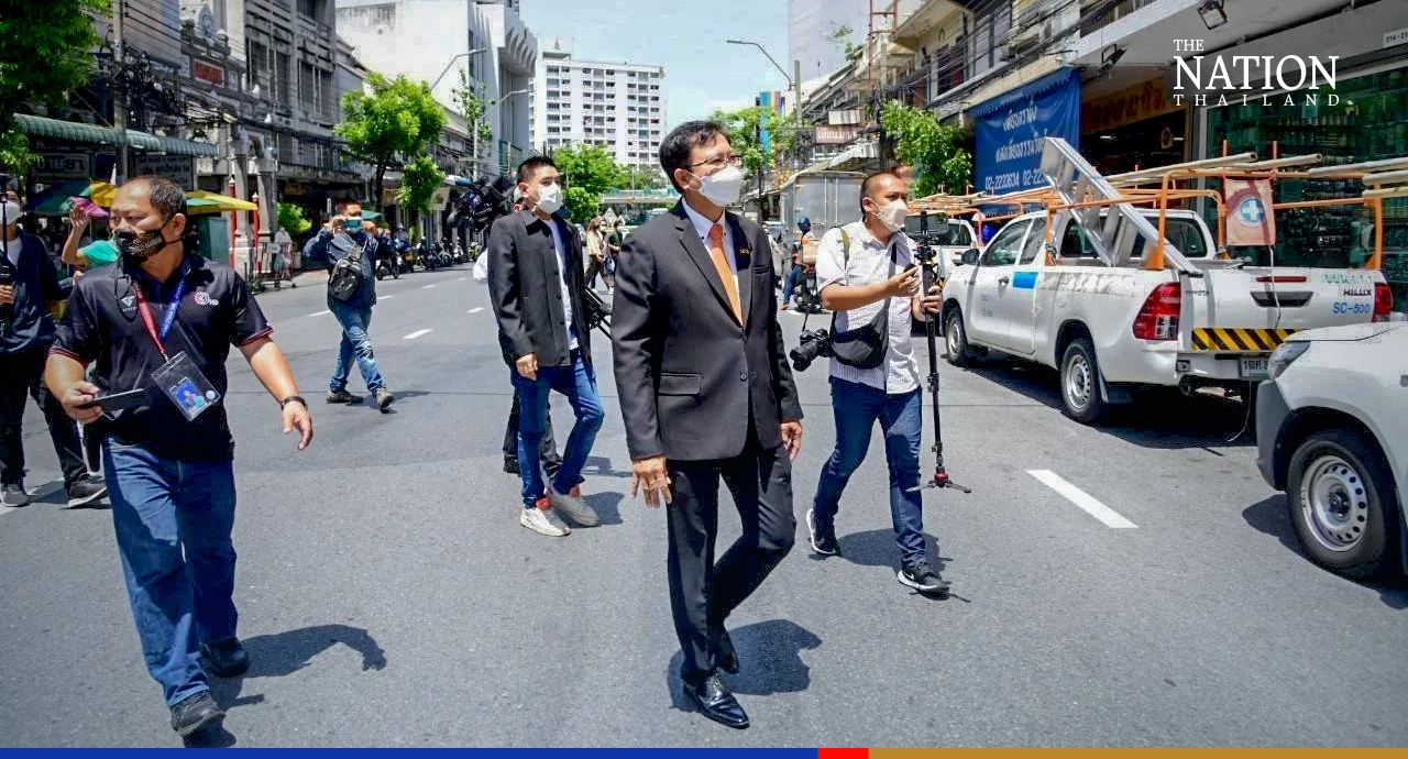 MEA tidies up power lines in Sampheng after fire