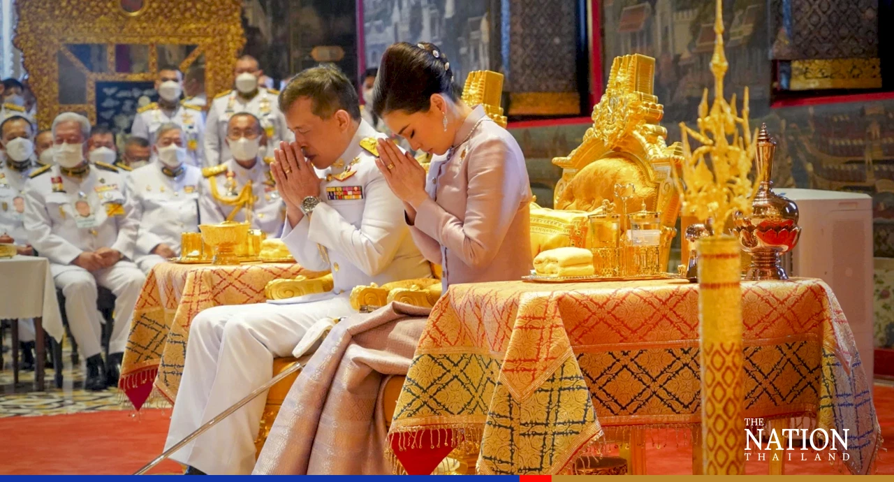 Their Majesties make merit on Asanha Bucha Day
