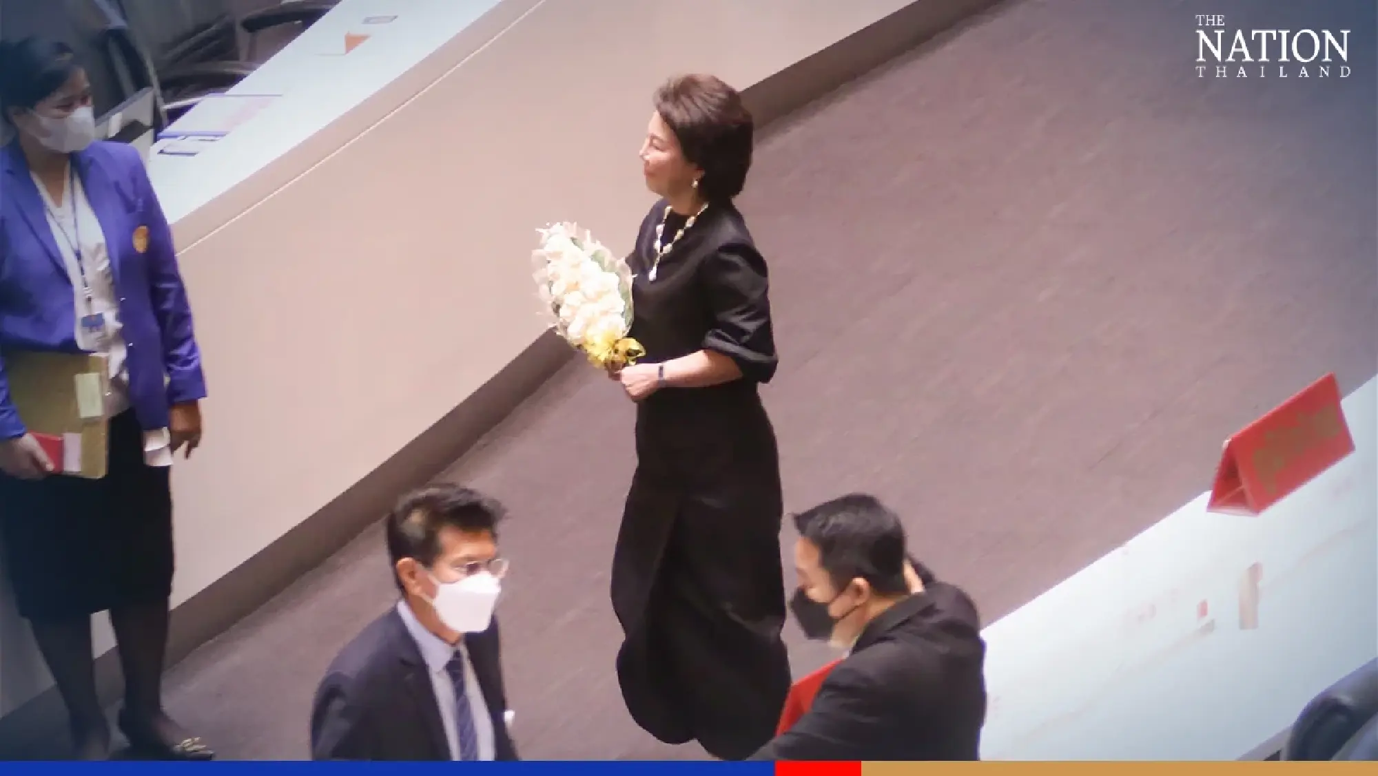 Opposition MPs place cremation flowers at Prayut’s Parliament podium