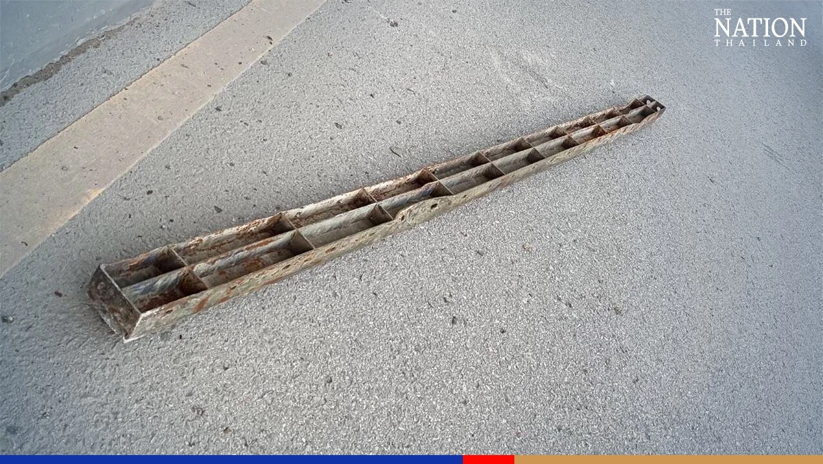 Car damaged as 3-metre metal bracket falls from truck at Rama II construction site