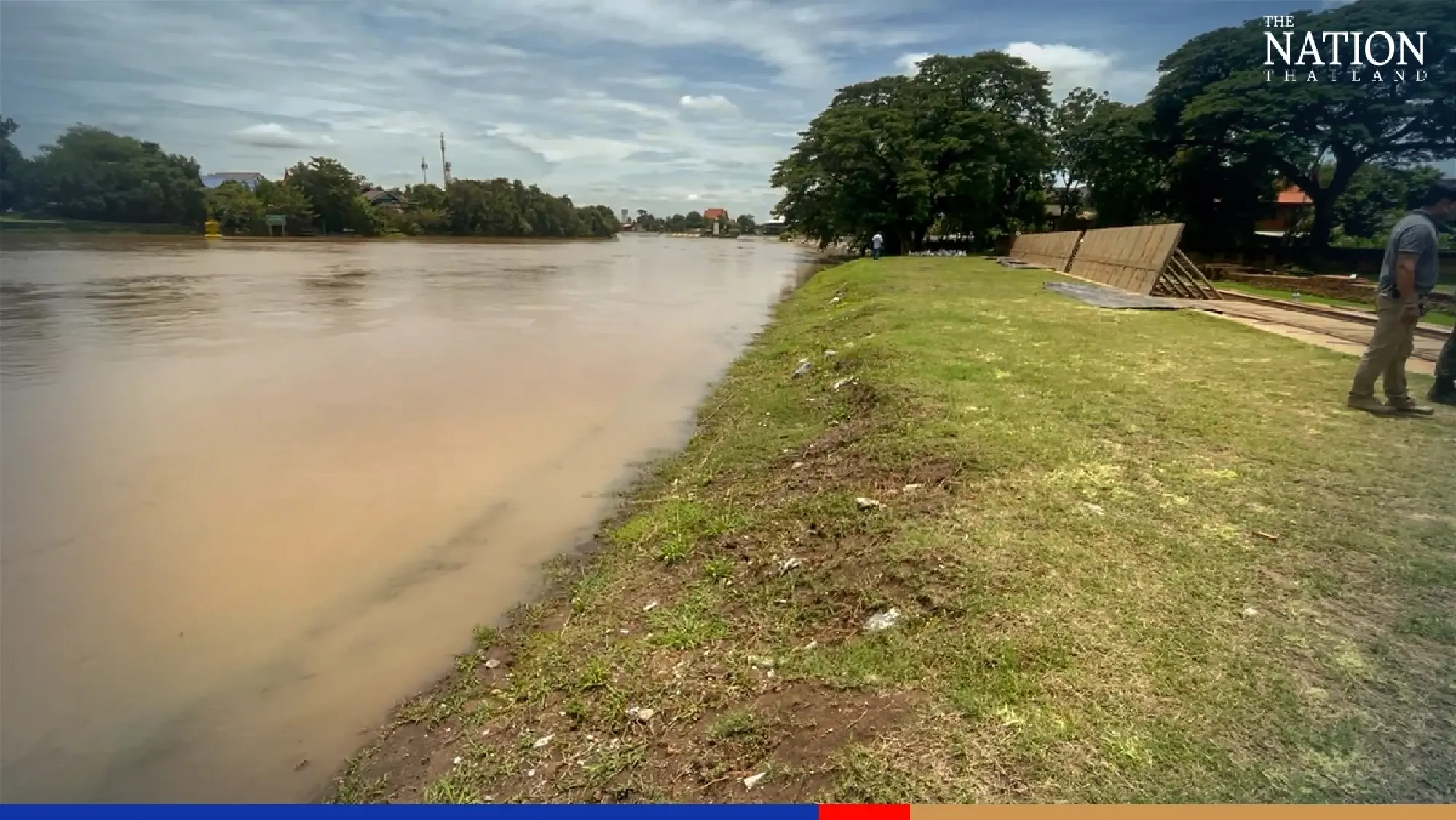Folding metal ramparts put up around ancient temple in Ayutthaya for protection from flooding