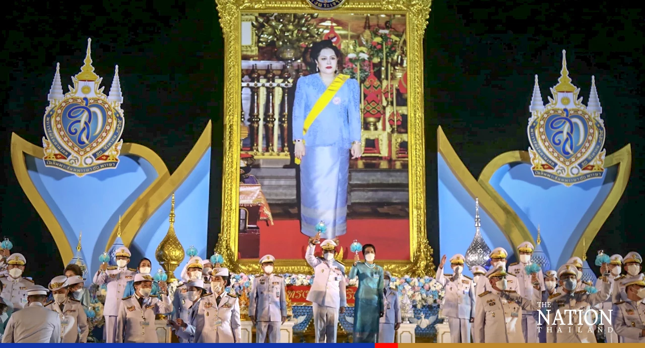 Their Majesties make merit to mark the Queen Mother’s 90th birthday