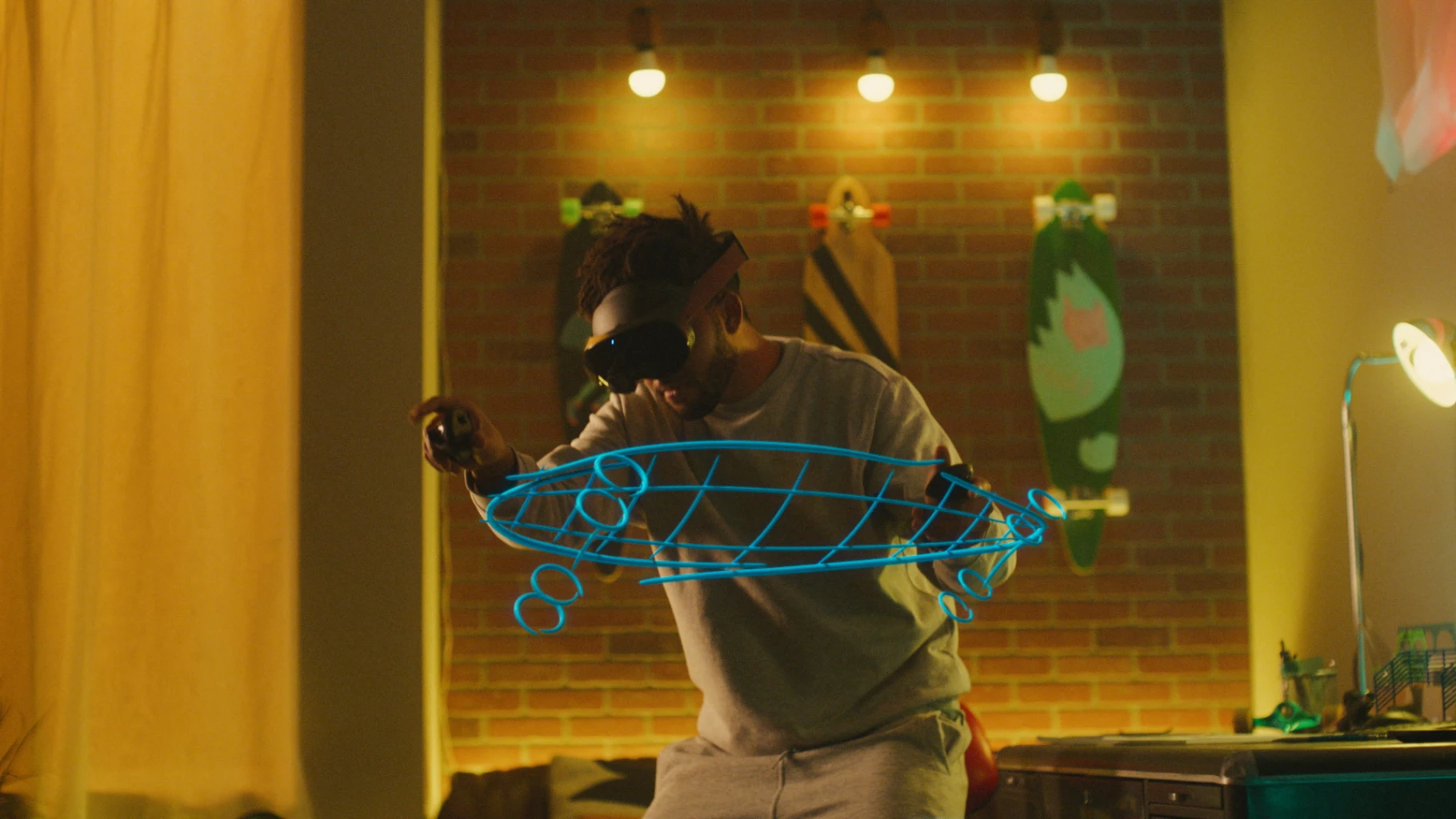 A man wearing a Meta Quest Pro interacts in mixed reality with a 3D virtual drawing of a skateboard, in this undated handout picture