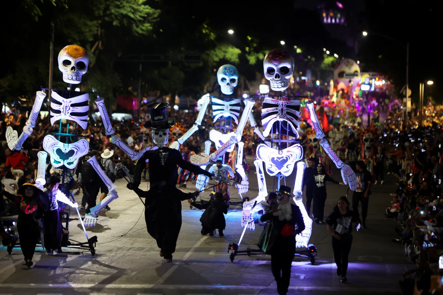 Mexicans party with ancestors in colourful Day of the Dead parade